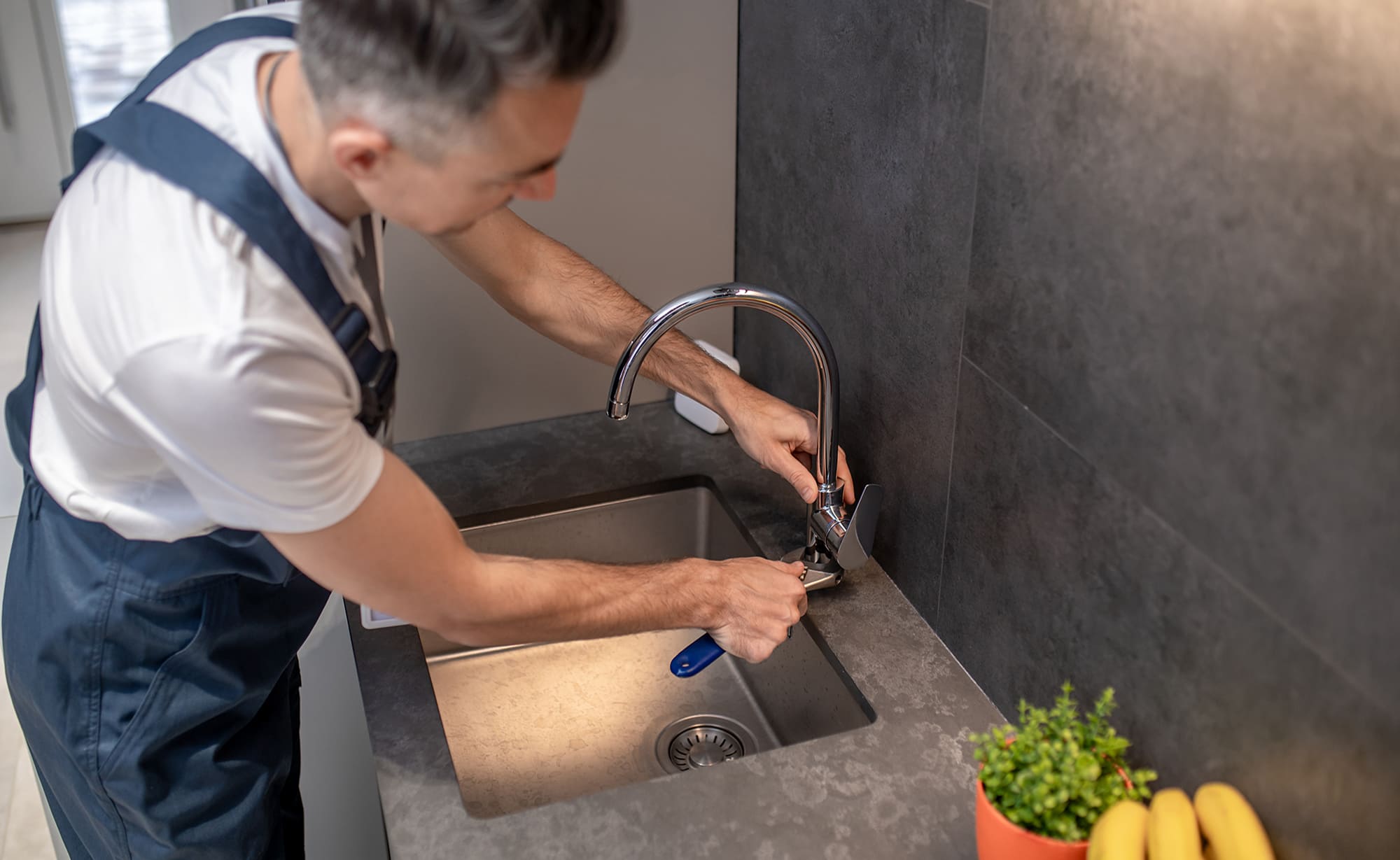 How to fix a dripping kitchen mixer tap?